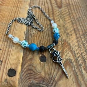 Handmade good luck bird skull necklace